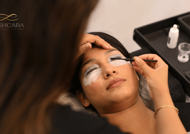 Lash artist performing a professional lash lift on an Indian client using silicone shields at Lashcara Lash Clinic in Pune.